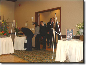 Mourners line up to sign the guest book